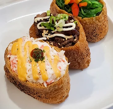 Topping inari pocket sushi at Pocket Holic in Kensington, Calgary